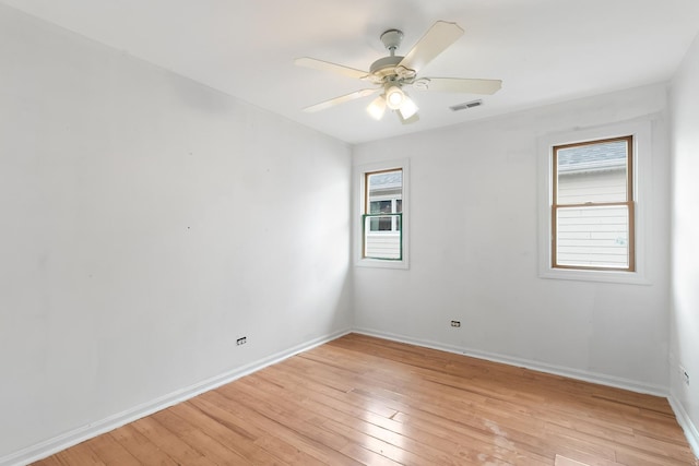 3326 W 107th St, Chicago, IL 60655 - unfurnished room with light wood finished floors and a ceiling fan