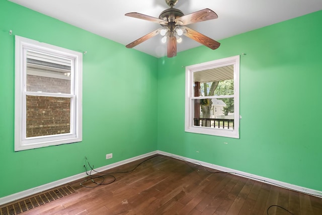 3326 W 107th St, Chicago, IL 60655 - unfurnished room featuring dark wood-type flooring and a ceiling fan