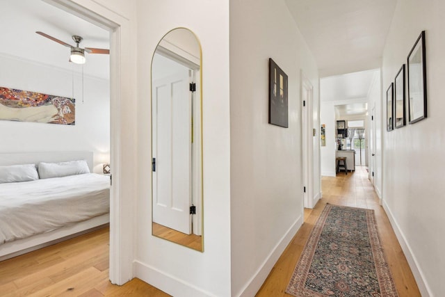 6329 N Wayne Ave Unit 3N, Chicago, IL 60660 - hallway with light wood-style floors and baseboards