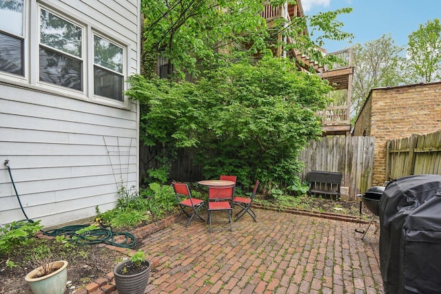 6329 N Wayne Ave Unit 3N, Chicago, IL 60660 - view of patio / terrace featuring outdoor dining area, grilling area, and stairs