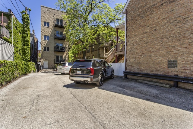 3938 N Southport Ave Unit G, Chicago, IL 60613 - uncovered parking lot with stairway