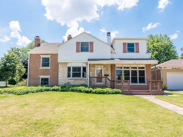 321 E Morningside Ave, Lombard, IL 60148 - traditional-style home featuring a porch, a front lawn, a chimney, a garage, and stone siding