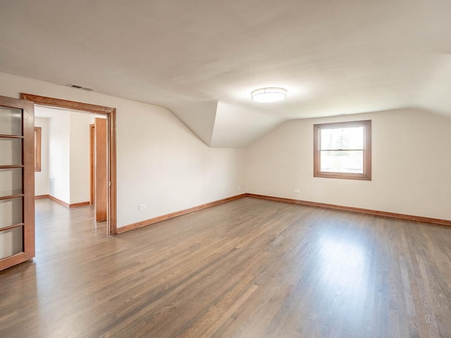321 E Morningside Ave, Lombard, IL 60148 - additional living space with wood finished floors and vaulted ceiling