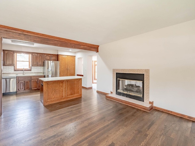 321 E Morningside Ave, Lombard, IL 60148 - kitchen featuring stainless steel appliances, dark wood finished floors, light countertops, and a center island