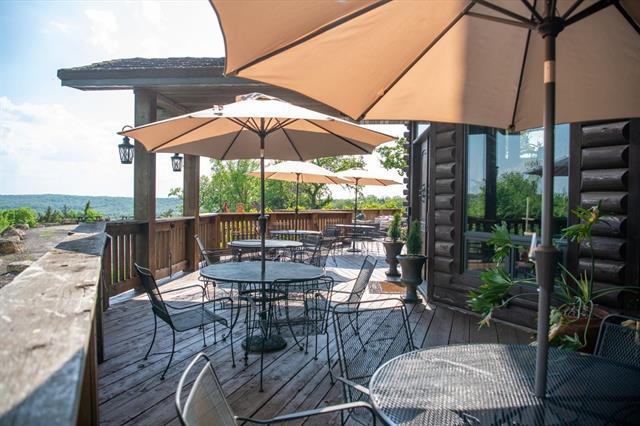 2003 W Hanover Rd, Hanover, IL 61041 - wooden deck with outdoor dining area