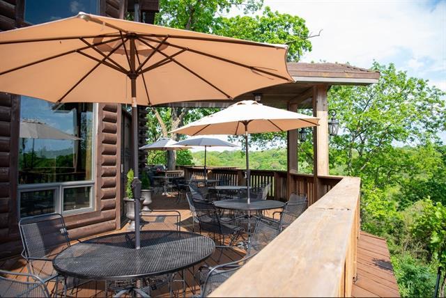 2003 W Hanover Rd, Hanover, IL 61041 - wooden deck featuring outdoor dining area