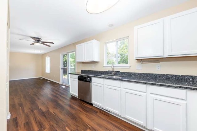 2054 Trafalger Ct, Romeoville, IL 60446 - kitchen with stainless steel dishwasher, dark wood-style floors, white cabinetry, a ceiling fan, and dark stone countertops