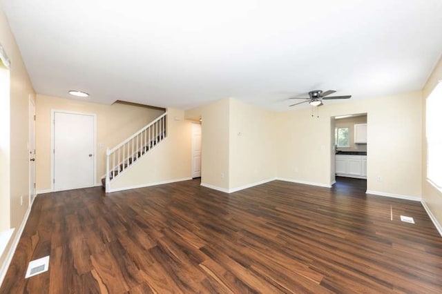 2054 Trafalger Ct, Romeoville, IL 60446 - unfurnished living room featuring stairs, a ceiling fan, and dark wood finished floors