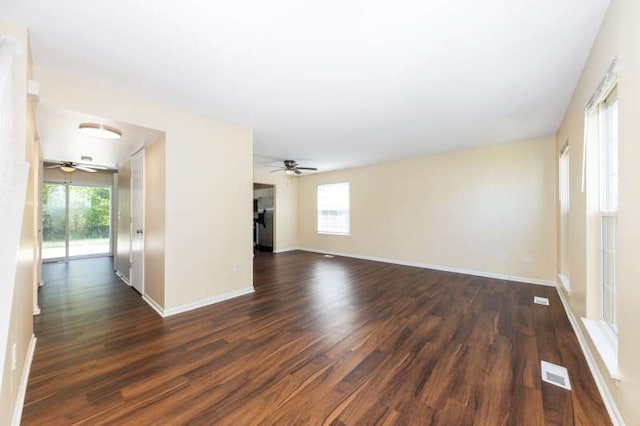 2054 Trafalger Ct, Romeoville, IL 60446 - unfurnished living room with a ceiling fan and dark wood-style floors