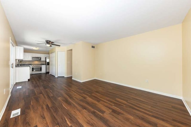 2054 Trafalger Ct, Romeoville, IL 60446 - unfurnished living room featuring dark wood-style flooring and a ceiling fan