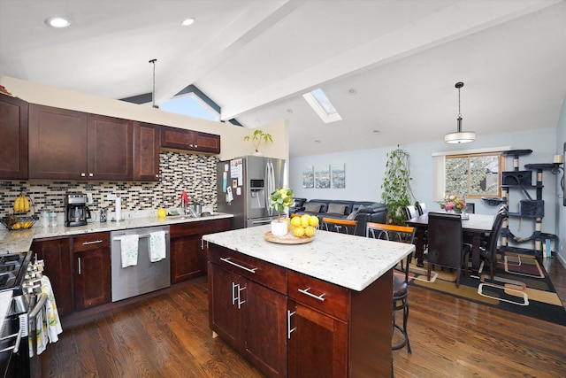 9631 Fullerton Ave, Franklin Park, IL 60131 - kitchen featuring stainless steel appliances, backsplash, dark wood-type flooring, a skylight, and recessed lighting