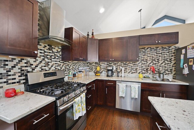 9631 Fullerton Ave, Franklin Park, IL 60131 - kitchen featuring stainless steel appliances, wall chimney exhaust hood, lofted ceiling, dark wood finished floors, and dark brown cabinetry
