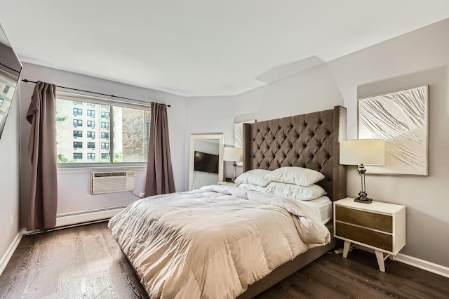 5100 N Sheridan Rd Unit 410, Chicago, IL 60640 - bedroom with a wall mounted air conditioner, baseboard heating, and wood finished floors
