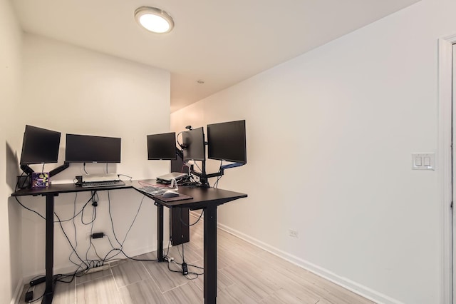 5100 N Sheridan Rd Unit 410, Chicago, IL 60640 - office area with baseboards and light wood-style floors