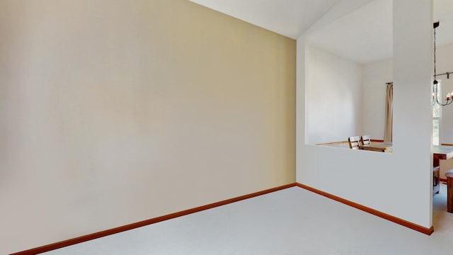 1389 Lily Cache Ln, Bolingbrook, IL 60490 - unfurnished room with carpet flooring and a chandelier