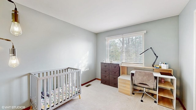1389 Lily Cache Ln, Bolingbrook, IL 60490 - bedroom with a desk, light carpet, and a crib