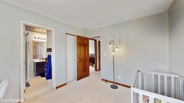 1389 Lily Cache Ln, Bolingbrook, IL 60490 - bedroom featuring light colored carpet, connected bathroom, and a closet
