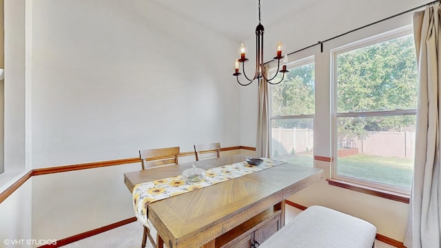 1389 Lily Cache Ln, Bolingbrook, IL 60490 - dining area featuring a chandelier and carpet