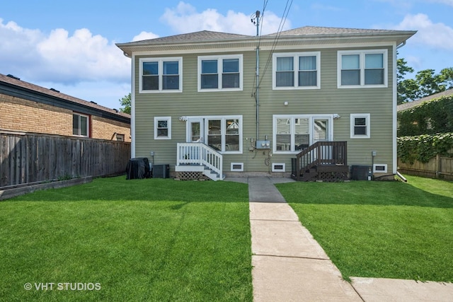 1828 Hovland Ct, Evanston, IL 60201 - rear view of house with a fenced backyard