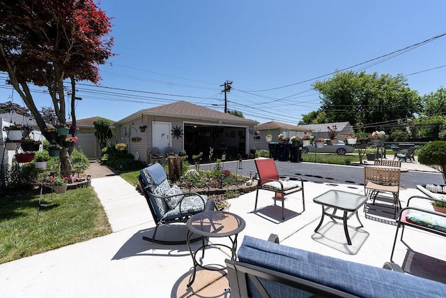 8805 S California Ave, Evergreen Park, IL 60805 - view of patio featuring an outbuilding and a garage