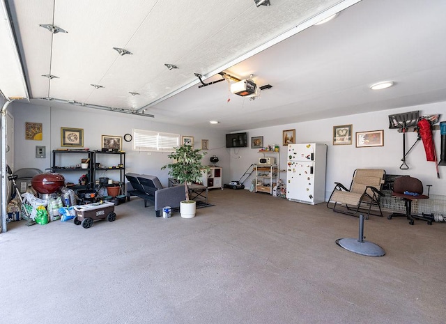 8805 S California Ave, Evergreen Park, IL 60805 - garage with freestanding refrigerator and a garage door opener
