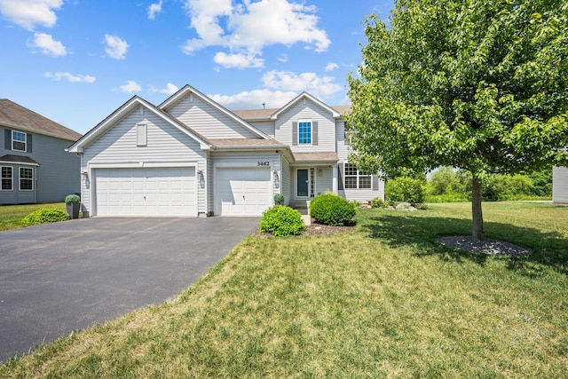 3462 Ayres Dr, Aurora, IL 60506 - view of front of property with driveway, a garage, and a front yard