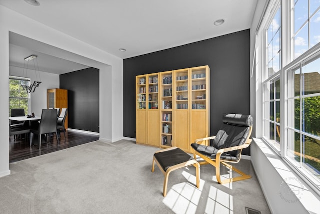 3462 Ayres Dr, Aurora, IL 60506 - living area featuring carpet flooring and a chandelier