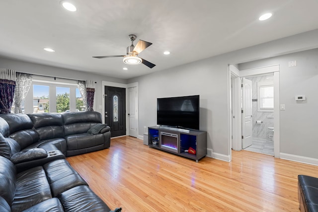 8313 W Ballard Rd, Niles, IL 60714 - living room with ceiling fan, plenty of natural light, light wood-type flooring, and recessed lighting