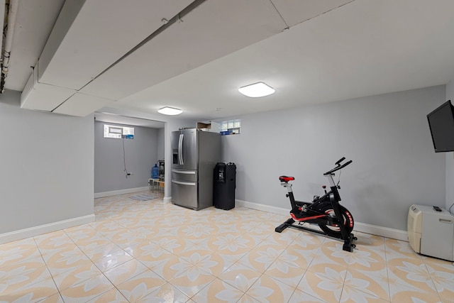 8313 W Ballard Rd, Niles, IL 60714 - exercise area with baseboards and light tile patterned floors