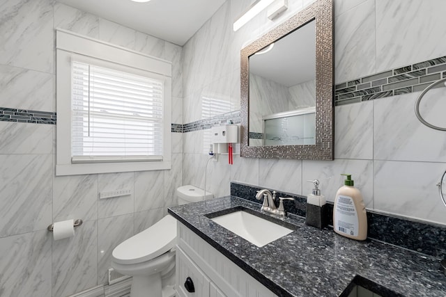 8313 W Ballard Rd, Niles, IL 60714 - full bathroom featuring tile walls, an enclosed shower, and vanity