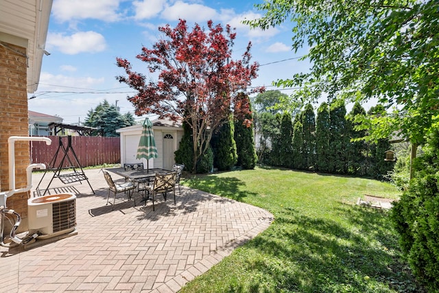 8313 W Ballard Rd, Niles, IL 60714 - view of yard featuring a patio, outdoor dining space, and an outdoor structure