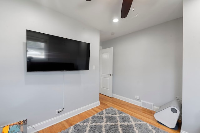8313 W Ballard Rd, Niles, IL 60714 - bedroom featuring wood finished floors, a ceiling fan, and recessed lighting