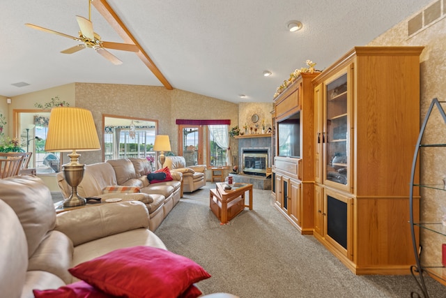 1422 Pier Dr, Lake Summerset, IL 61019 - living area with lofted ceiling, carpet, a tiled fireplace, and ceiling fan