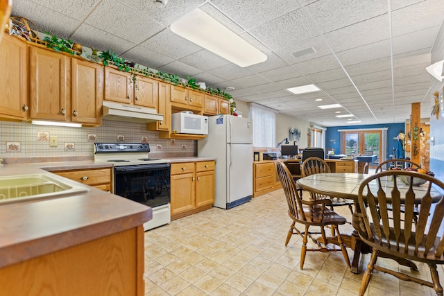 1422 Pier Dr, Lake Summerset, IL 61019 - kitchen with white appliances, under cabinet range hood, healthy amount of natural light, backsplash, and a drop ceiling