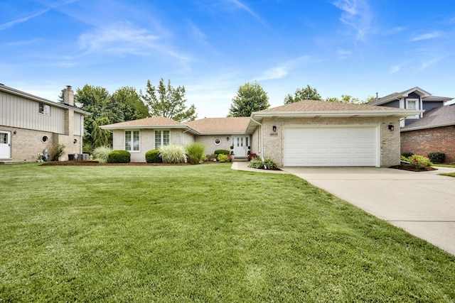 19635 Swanberg Ln, Mokena, IL 60448 - view of front facade featuring an attached garage, concrete driveway, a front lawn, and brick siding