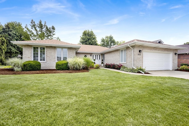 19635 Swanberg Ln, Mokena, IL 60448 - view of front of property with brick siding, a garage, concrete driveway, and a front yard