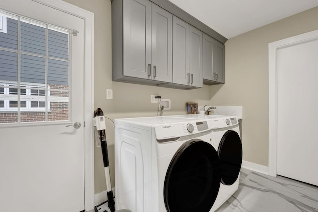 19635 Swanberg Ln, Mokena, IL 60448 - laundry area featuring light marble finish flooring, cabinet space, and washer and dryer