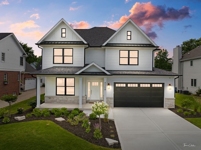 4508 Stonewall Ave, Downers Grove, IL 60515 - modern inspired farmhouse featuring a porch, board and batten siding, an attached garage, a standing seam roof, and driveway