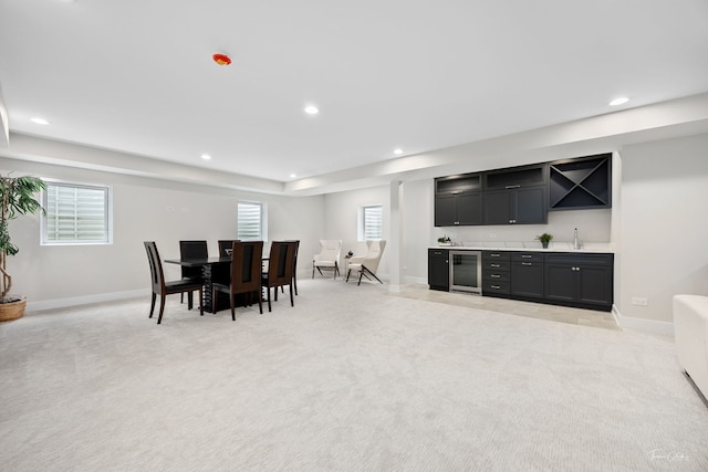 4508 Stonewall Ave, Downers Grove, IL 60515 - dining room featuring wet bar, recessed lighting, light colored carpet, and beverage cooler