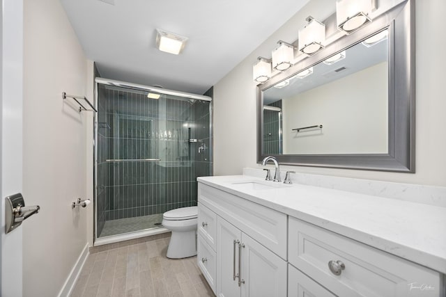 4508 Stonewall Ave, Downers Grove, IL 60515 - full bathroom featuring vanity, a shower stall, and wood finished floors