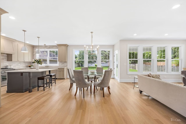 4508 Stonewall Ave, Downers Grove, IL 60515 - dining space featuring light wood-style flooring, recessed lighting, and a chandelier