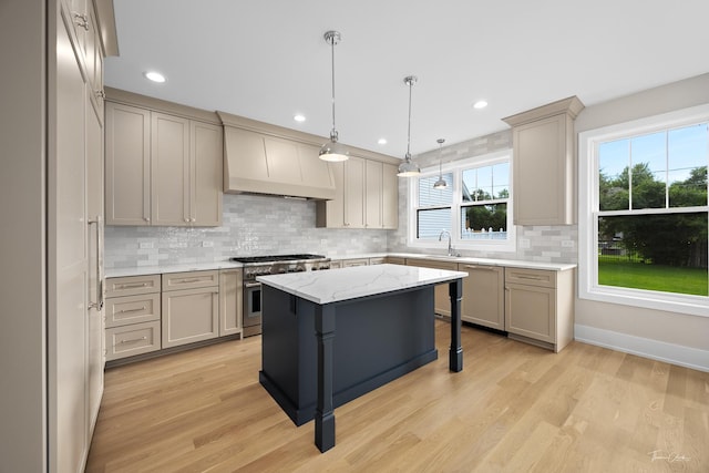 4508 Stonewall Ave, Downers Grove, IL 60515 - kitchen with high end range, premium range hood, tasteful backsplash, gray cabinetry, and recessed lighting