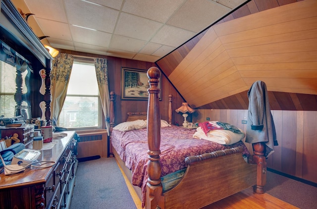 5145 S Troy St, Chicago, IL 60632 - bedroom with radiator heating unit, wooden walls, and lofted ceiling