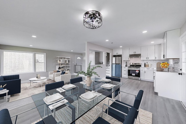 8433 W Betty Ter W, Niles, IL 60714 - dining space featuring light wood-style floors and recessed lighting