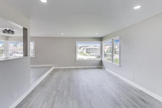 8433 W Betty Ter W, Niles, IL 60714 - unfurnished room featuring light wood-type flooring and recessed lighting