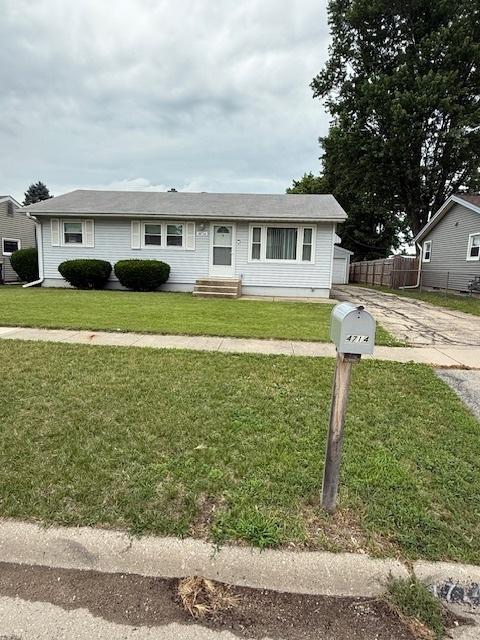 4714 Pine Al St, Machesney Park, IL 61115 - single story home with concrete driveway and entry steps