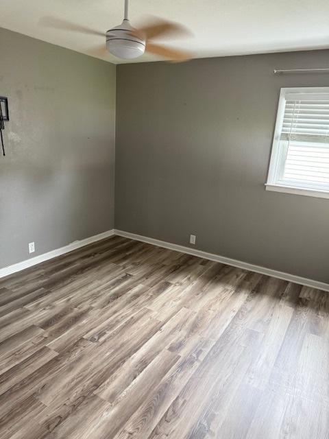 4714 Pine Al St, Machesney Park, IL 61115 - empty room with wood finished floors and ceiling fan