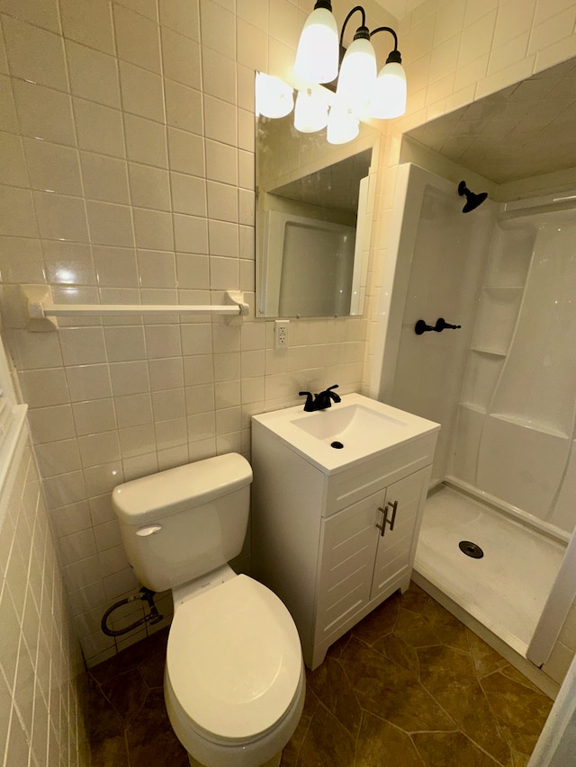 207 Dodge Ave, Danville, IL 61832 - bathroom featuring tile walls, vanity, and a stall shower