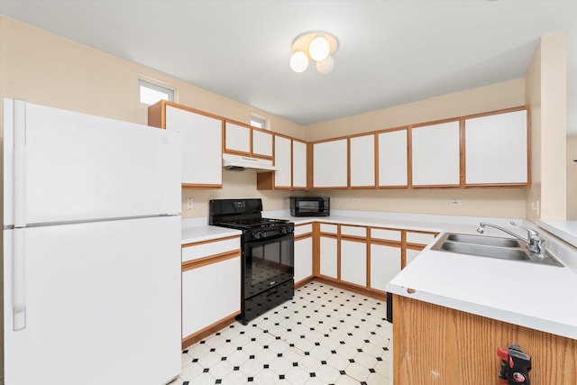43 Freesia Ct, Romeoville, IL 60446 - kitchen featuring black appliances, under cabinet range hood, light countertops, light flooring, and white cabinets