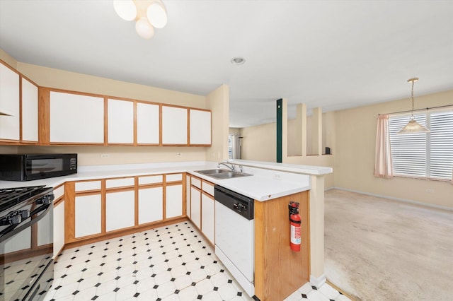 43 Freesia Ct, Romeoville, IL 60446 - kitchen featuring black microwave, dishwasher, stove, a peninsula, and light countertops